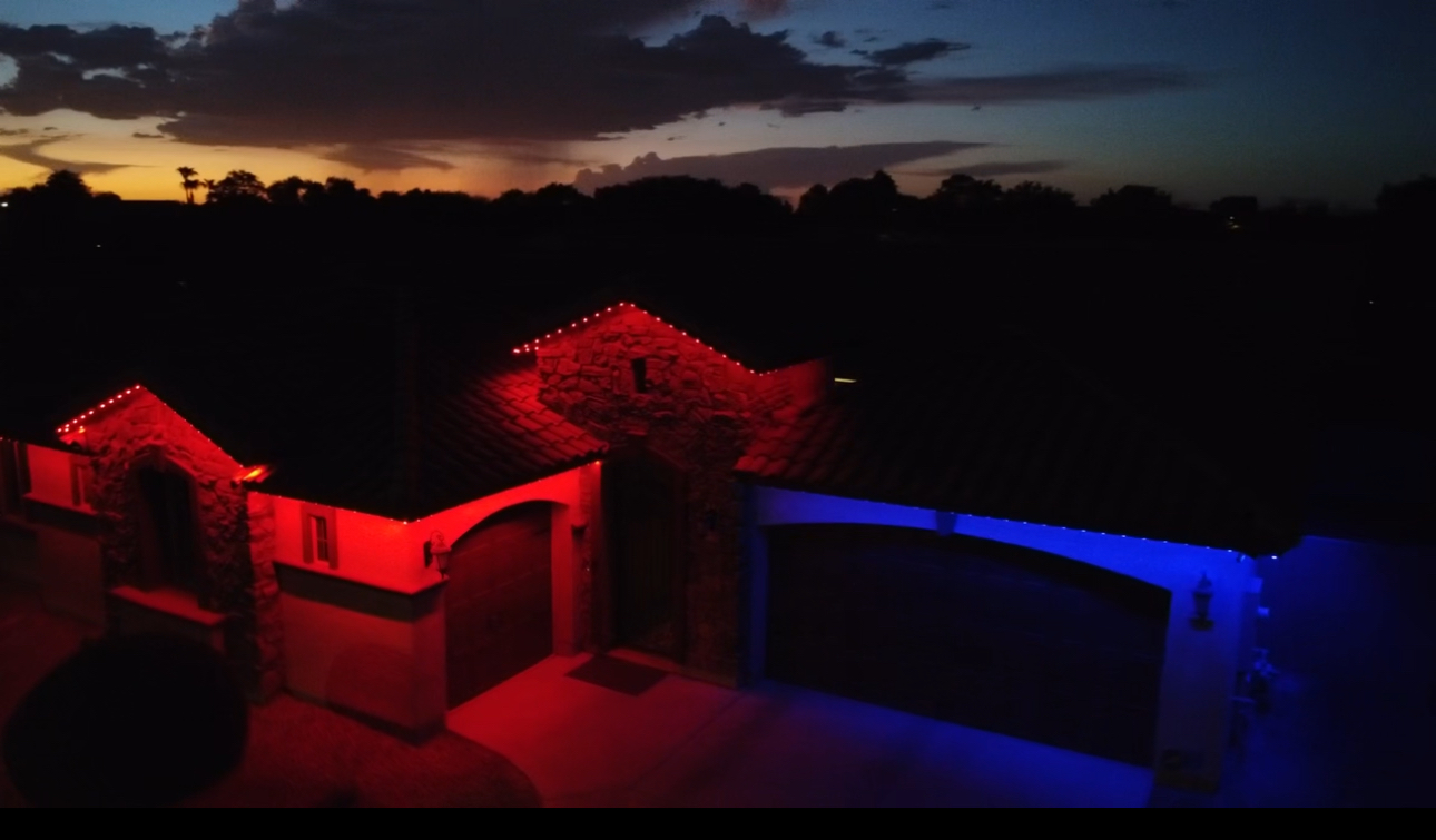 Phoenix home with invisible HOA-friendly permanent LED roofline lighting tracks during daytime